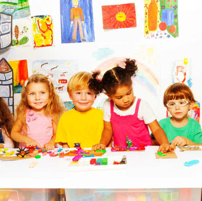 young students in the paly room